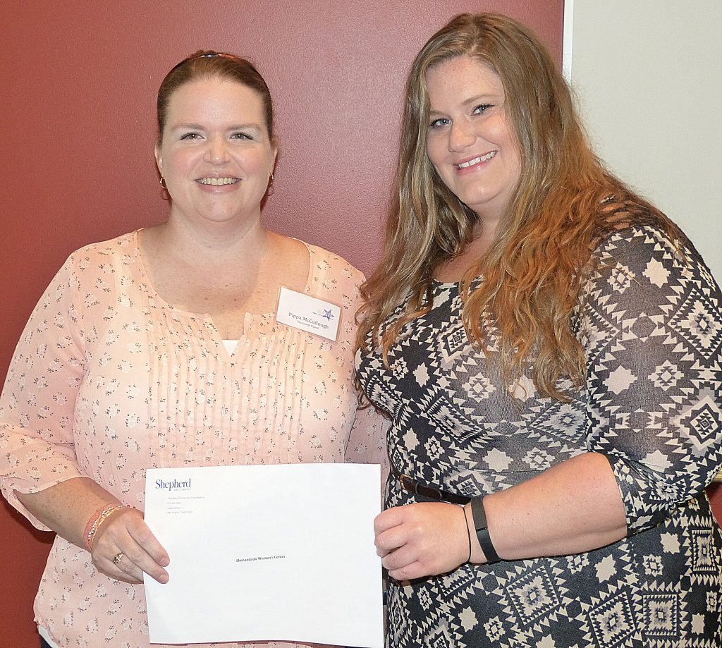 Shenandoah Women's Center Executive Director Pippa McCullough (l) and Program Manager Katie Spriggs accept the 2016 WISH nonprofit grant award